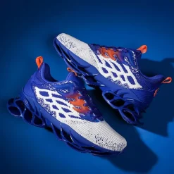 Hot OUKU Men's Blue Athletic Sneakers with Unique Hollow Sole Design, Breathable Knit Upper, and Flame Detail – Lightweight Running Shoes with Orange Accents
