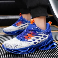 Hot OUKU Men's Blue Athletic Sneakers with Unique Hollow Sole Design, Breathable Knit Upper, and Flame Detail – Lightweight Running Shoes with Orange Accents