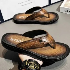 Hot OUKU Men's Brown Casual Flip Flops with Textured Footbed and Adjustable Strap – Comfortable Outdoor Sandals for Summer and Beach Wear